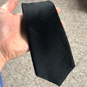 Black Calvin Klein tie with subtle black stripes